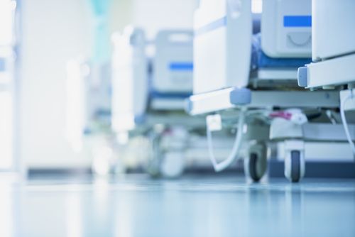 Image is a blurred photo of hospital equipment concept of Lewisville personal injury lawyer