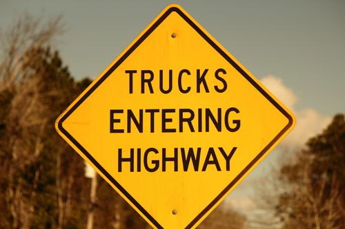 Image is of a traffic sign that says 'trucks entering highway' concept of Clemmons truck accident lawyer