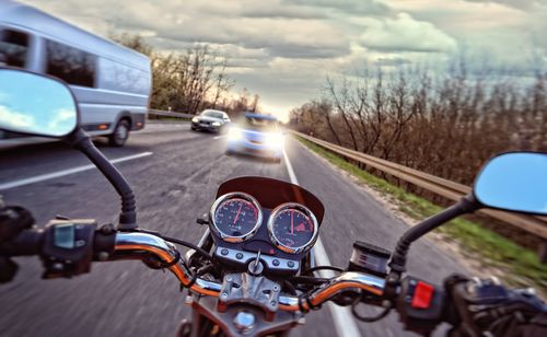 Image is of the point of view of a motorcycle about to hit a car head on, concept of Winston Salem head-on collision lawyer